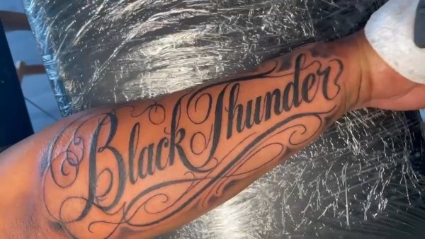 Black Thunder lettering tattoo